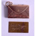 A VERY RARE ANTIQUE GOLD ENVELOPE LETTER PENDANT. 2.3 grams. (2)