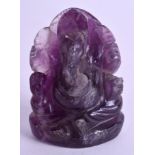 AN INDIAN CARVED AMETHYST GANESHA. 5 cm x 3.5 cm.