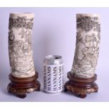 A FINE PAIR OF 19TH CENTURY JAPANESE MEIJI PERIOD IVORY TUSK VASES upon gold lacquered bases. 26 cm