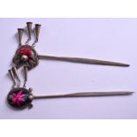 TWO CHINESE SILVER AND SILK HAIR PINS. (2)