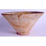 A MIDDLE EASTERN KASHAN POTTERY BOWL. 22.5 cm wide.