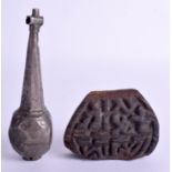 AN EARLY MIDDLE EASTERN SILVER SEAL together with a wooden stamp. 13 cm & 7 cm wide. (2)