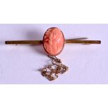 AN ANTIQUE 9CT GOLD AND CORAL BROOCH. 3.7 grams. 5.75 cm wide.
