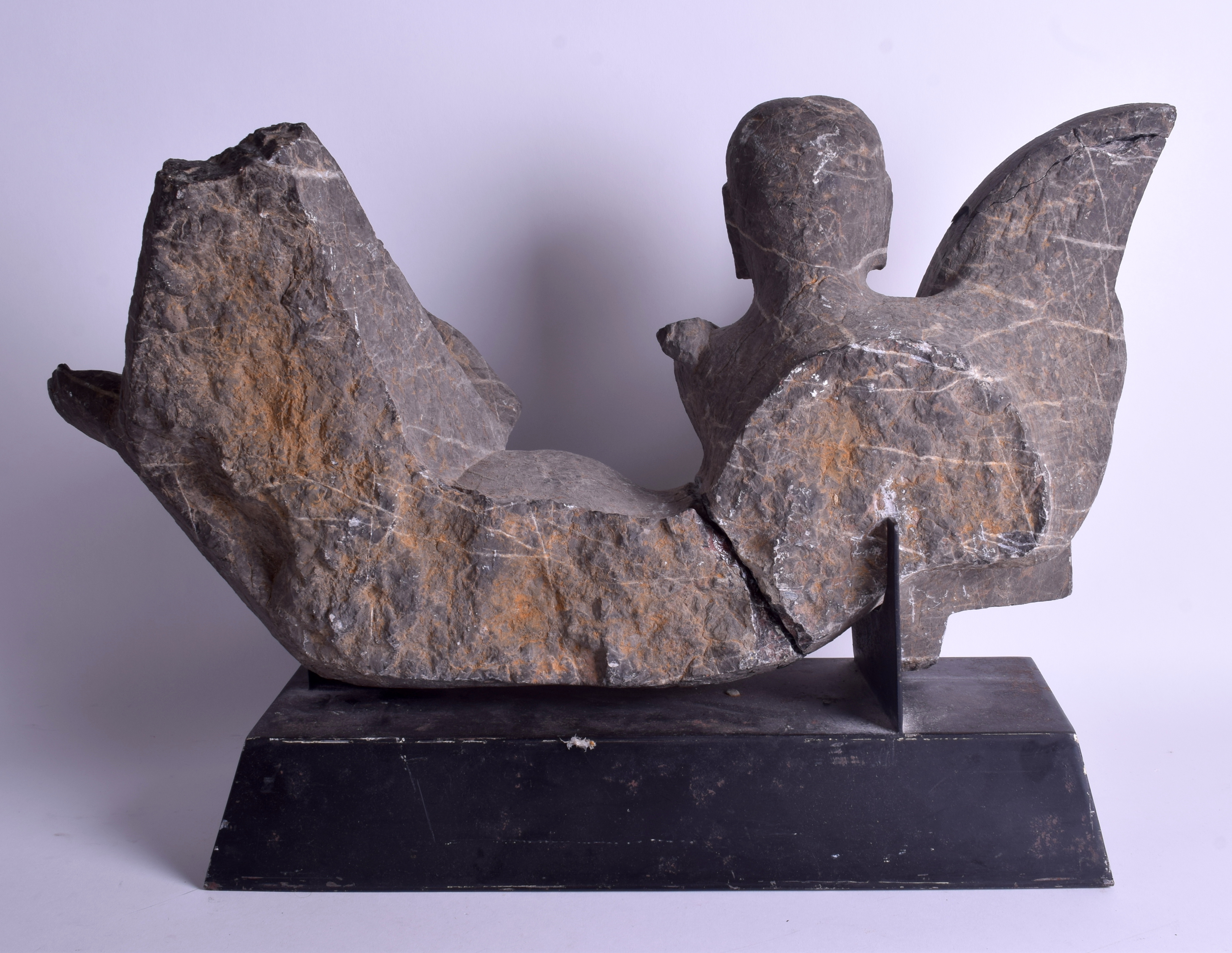 A VERY LARGE CENTRAL ASIAN STONE CARVING OF AN IMMORTAL modelled upon a plinth. Stone 60 cm x 32 cm - Image 2 of 2