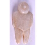 A CENTRAL ASIAN STONE IDOL. 6 cm x 3 cm.