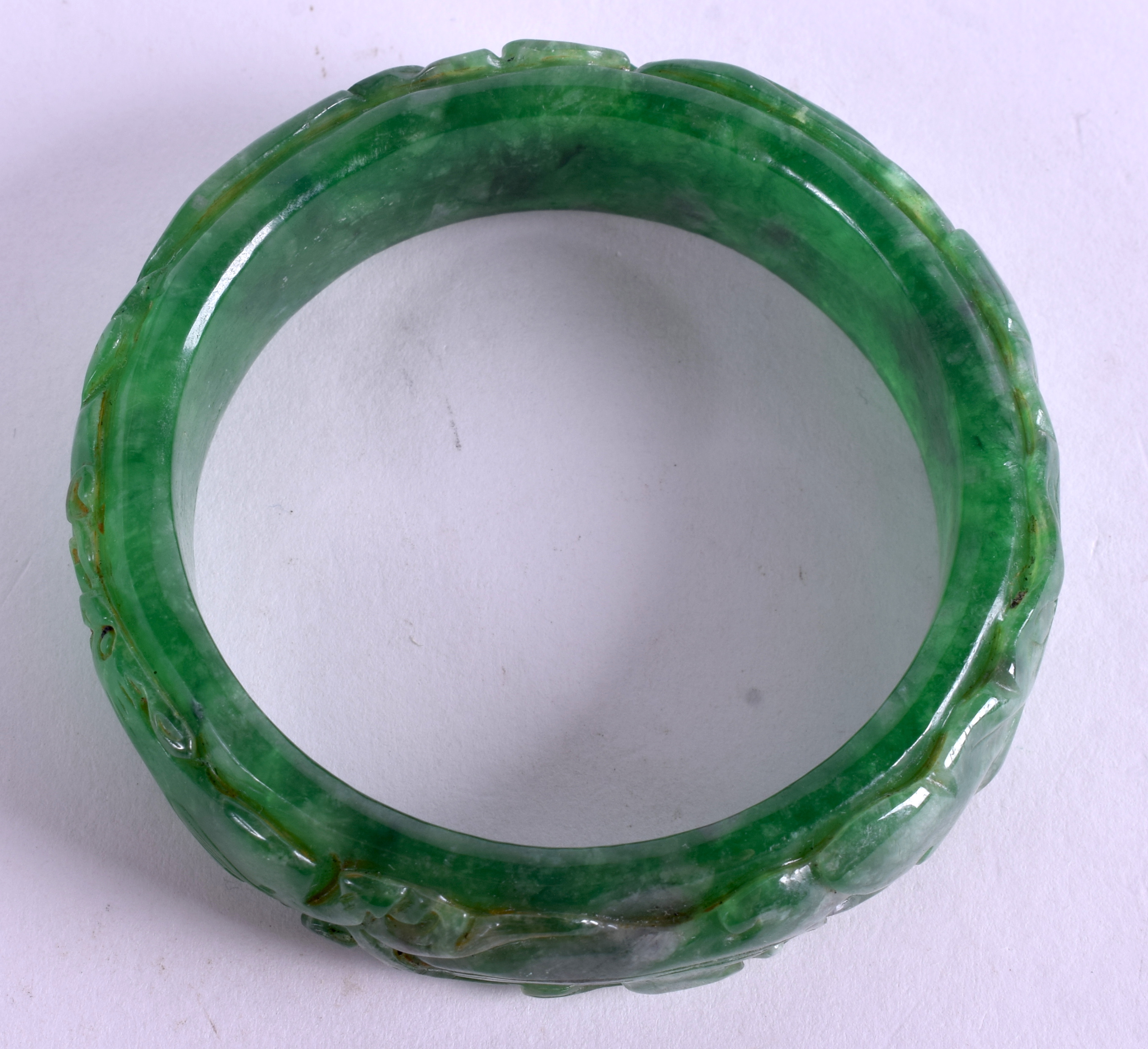 A CHINESE JADE BANGLE. 7.5 cm wide. - Image 3 of 3