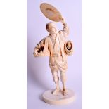 A 19TH CENTURY JAPANESE MEIJI PERIOD CARVED IVORY BIRD CATCHER OKIMONO modelled holding aloft his h