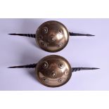 A RARE PAIR OF 18TH/19TH CENTURY INDIAN BRONZE MADU PARRYING WAR SHIELD DOUBLE DAGGER, formed with