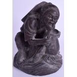 A CHINESE CARVED HARDWOOD MALE. 22 cm x 14 cm.