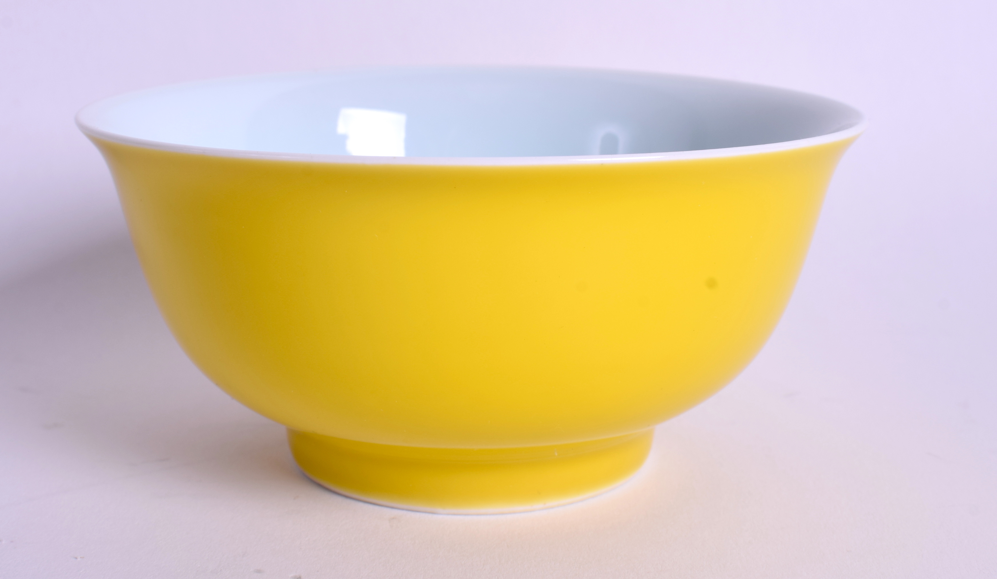 A CHINESE IMPERIAL YELLOW GROUND PORCELAIN BOWL bearing Kangxi marks to base. 11 cm wide. - Image 2 of 3