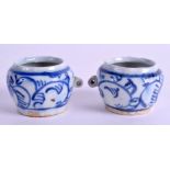 A PAIR OF 19TH CENTURY CHINESE BLUE AND WHITE BIRD FEEDERS. 5 cm wide.