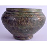 AN ANTIQUE MIDDLE EASTERN ISLAMIC BRASS PLANTER. 19 cm wide.