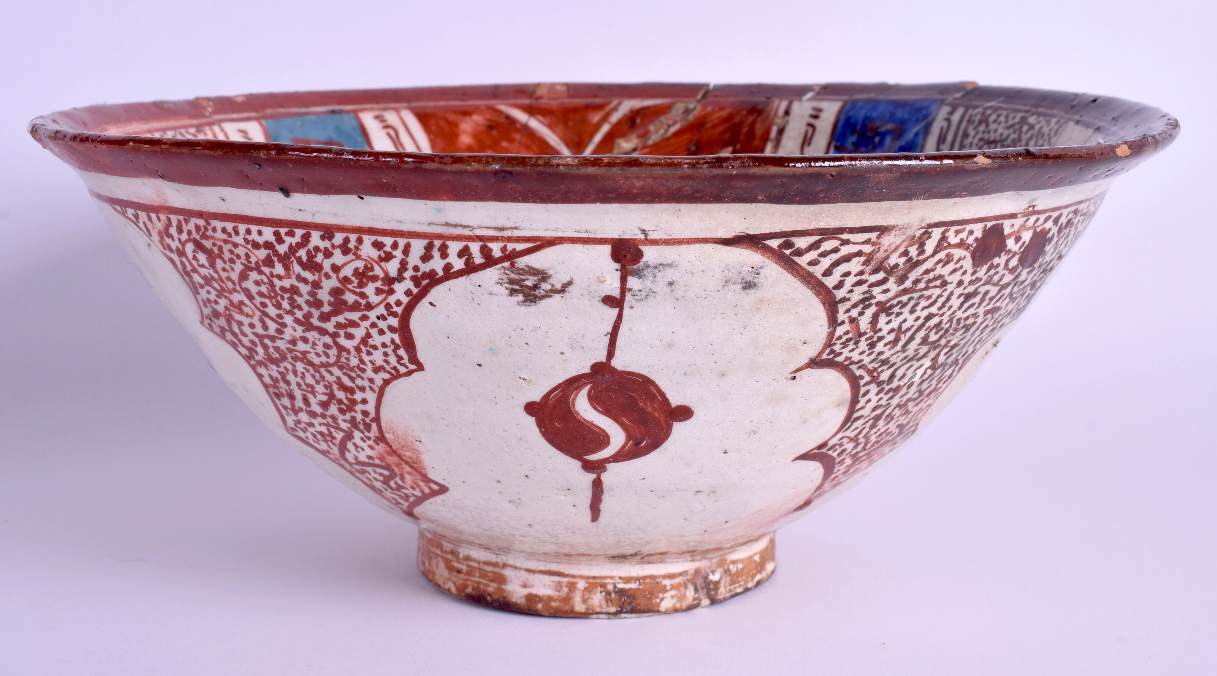 A 13TH CENTURY PERSIAN KASHAN LUSTRE POTTERY BOWL C1250 painted with motifs and calligraphy. 24 cm