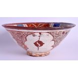 A 13TH CENTURY PERSIAN KASHAN LUSTRE POTTERY BOWL C1250 painted with motifs and calligraphy. 24 cm