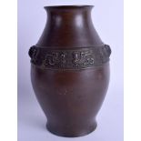 A 19TH CENTURY JAPANESE MEIJI PERIOD BRONZE VASE. 20.5 cm high.