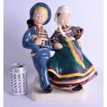 A RARE LARGE FRENCH HENRI QUIMPER POTTERY FIGURE OF PEASANTS Bel Delecourt. 36 cm x 25 cm.