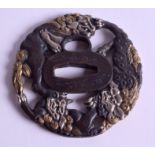 A JAPANESE BRONZE AND SILVER TSUBA. 7.5 cm wide.