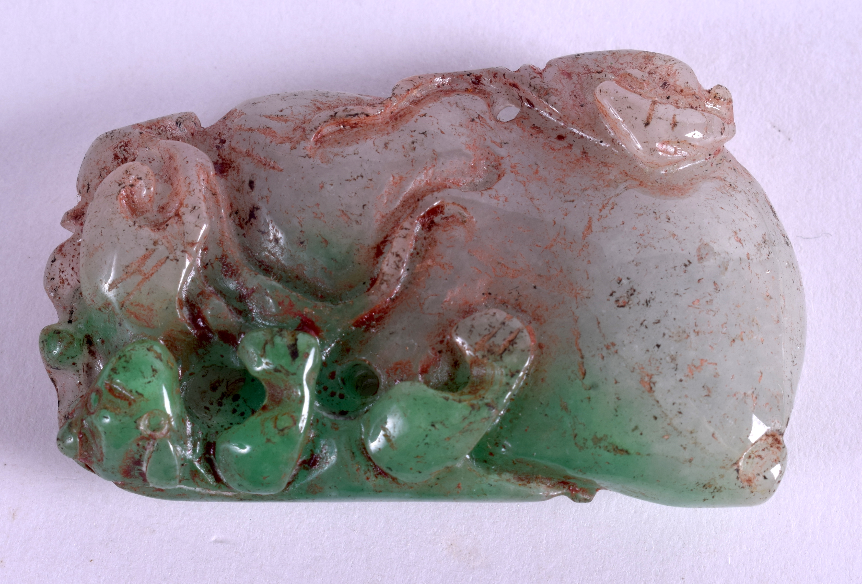 A CHINESE JADEITE PLAQUE. 3 cm x 5.5 cm.