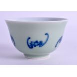 A CHINESE BLUE AND WHITE CELADON TEABOWL painted with bats. 8.5 cm wide.
