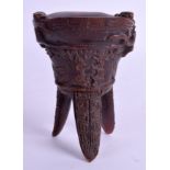 A CHINESE CARVED HORN LIBATION CUP. 11 cm x 8 cm.