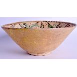 A MIDDLE EASTERN KASHAN POTTERY BOWL. 22.5 cm wide.