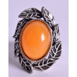 A SILVER AND AMBER RING. Size T.