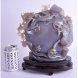 A RARE LARGE EARLY 20TH CENTURY CHINESE CARVED AGATE BOULDER overlaid with buddhistic lions and dra