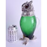 A NOVELTY OWL CLARET JUG. 29 cm high.