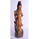 A CHINESE POLYCHROMED WOOD FIGURE OF GUANYIN. 41 cm high.