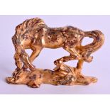 A CHINESE GILT BRONZE FIGURE OF A HORSE. 6 cm x 5 cm.