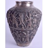 A MIDDLE EASTERN PERSIAN SILVERED COPPER VASE decorated with figures. 17 cm high.