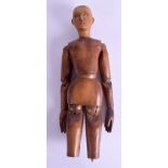 A 19TH CENTURY CARVED TREEN WOOD ARTICULATED ARTISTS DOLL. 37 cm long.