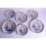 A SET OF SIX 18TH CENTURY JAPANESE EDO PERIOD IMARI KAKIEMON PLATES painted with a fenced garden. L