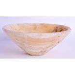 AN EGYPTIAN CENTRAL ASIAN ALABASTER CONICAL BOWL. 14 cm wide.