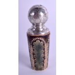 A 19TH CENTURY DOULTON LAMBETH SALT GLAZED SCENT BOTTLE decorated with pebble like motifs. 6.75 cm