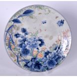 A JAPANESE PORCELAIN DISH, decorated with insects and foliage. 24.5 cm wide.