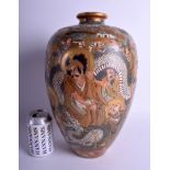 A LARGE 19TH CENTURY JAPANESE MEIJI PERIOD SATSUMA VASE painted with immortals and dragons. 37 cm x