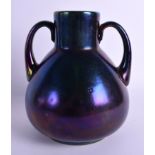 AN ART NOUVEAU AUSTRIAN PURPLE IRIDESCENT GLASS VASE. 20 cm x 15 cm.