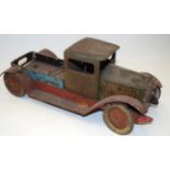 A PRE WAR TIN PLATE TOY TRUCK, “Dunlop Coord”. 33 cm wide.