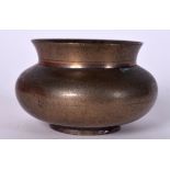 AN 18TH CENTURY ISLAMIC BRONZE CENSER, formed with a flared rim. 9 cm wide.