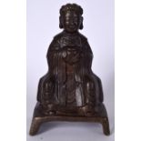 A CHINESE BRONZE BUDDHA, formed seated holding a vessel upon a rectangular throne. 23 cm high.