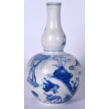 A 20TH CENTURY CHINESE BLUE AND WHITE DOUBLE GOURD VASE, decorated in the Kangxi style. 22 cm high.
