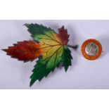 A VINTAGE SILVER AND ENAMEL LEAF BROOCH together with another. (2)