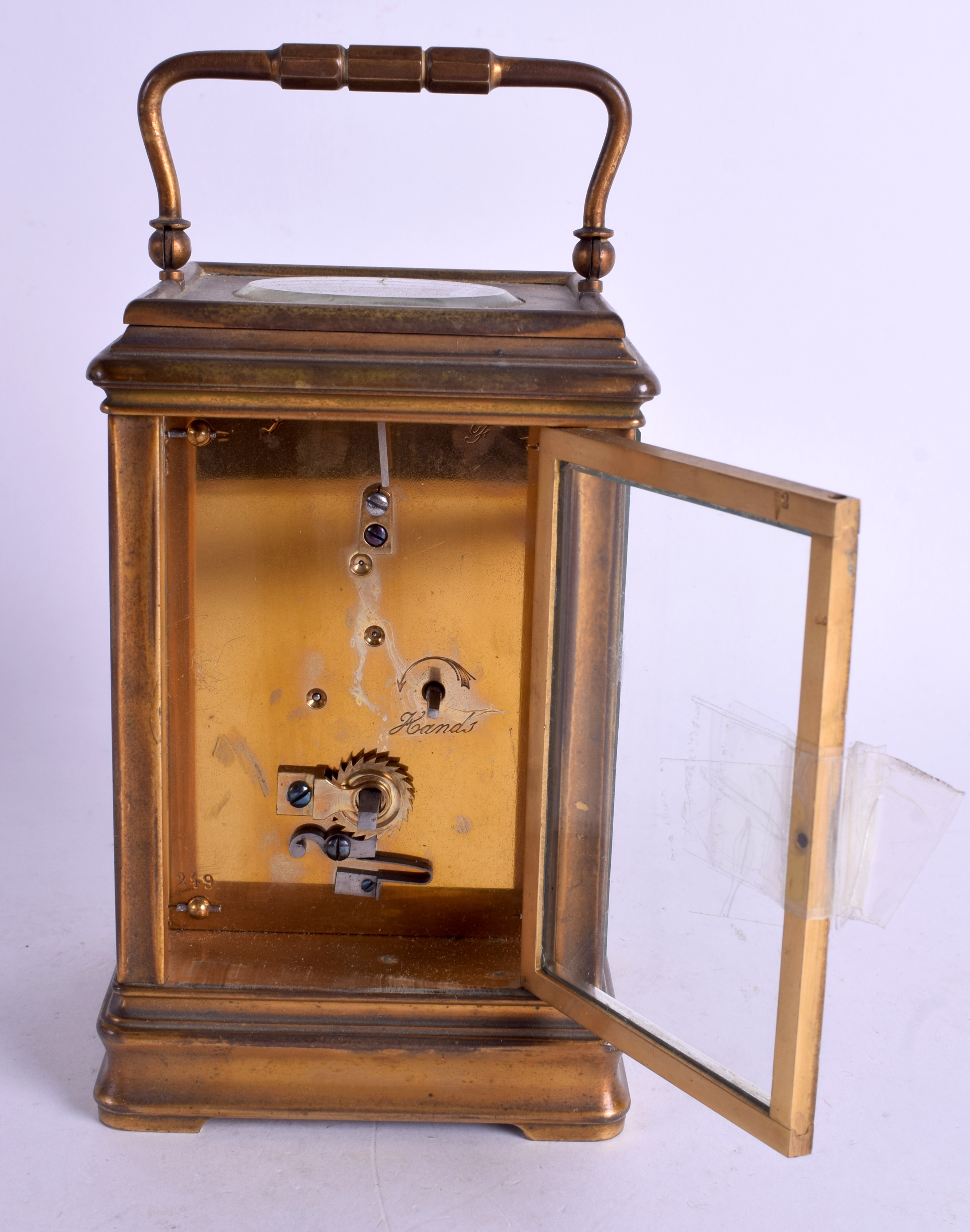 AN ANTIQUE FRENCH BRASS CARRIAGE CLOCK with roman numeral & numerical dial. 17.5 cm high inc handle - Image 2 of 3