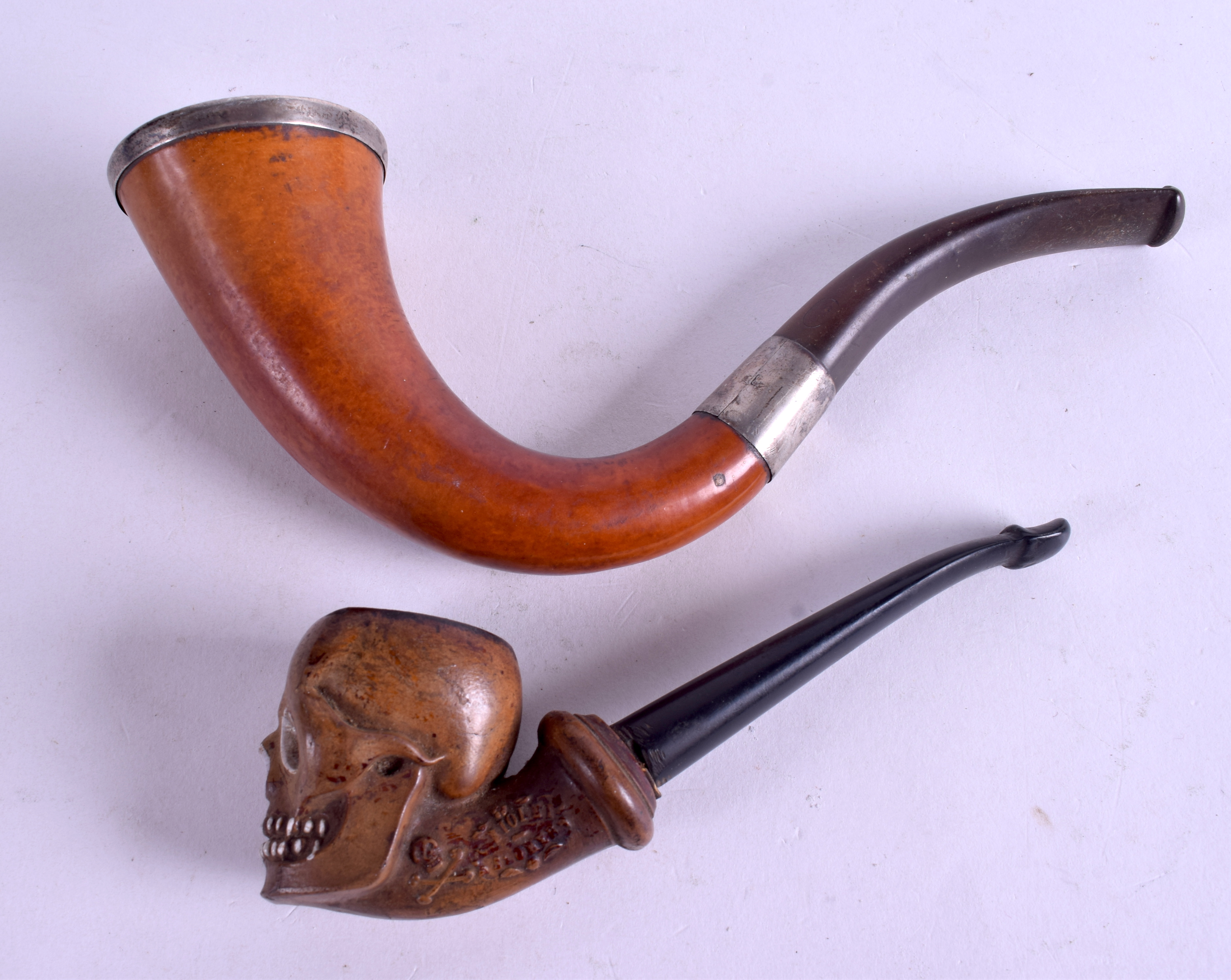 AN ANTIQUE CARVED MEERSCHAUM SKULL PIPE together with another similar. 11 cm & 16 cm long. (2) - Image 2 of 3