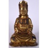 A CHINESE GILT BRONZE BUDDHA, formed seated in a meditative state. 22.5 cm high.