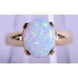 A 9CT GOLD AND OPAL RING. 4.6 grams. Size Q/R.