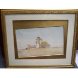 ARABIC SCHOOL (19th/20th century) FRAMED WATERCOLOUR, signed, a figure in a landscape. 21.5 cm x 35