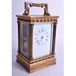 A GOOD FRENCH L'EPPE CARRIAGE CLOCK with classical column supports. 18 cm high inc handle.