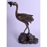 A 19TH CENTURY JAPANESE MEIJI PERIOD BRONZE OKIMONO modelled as a roaming bird. 26 cm x 11 cm.